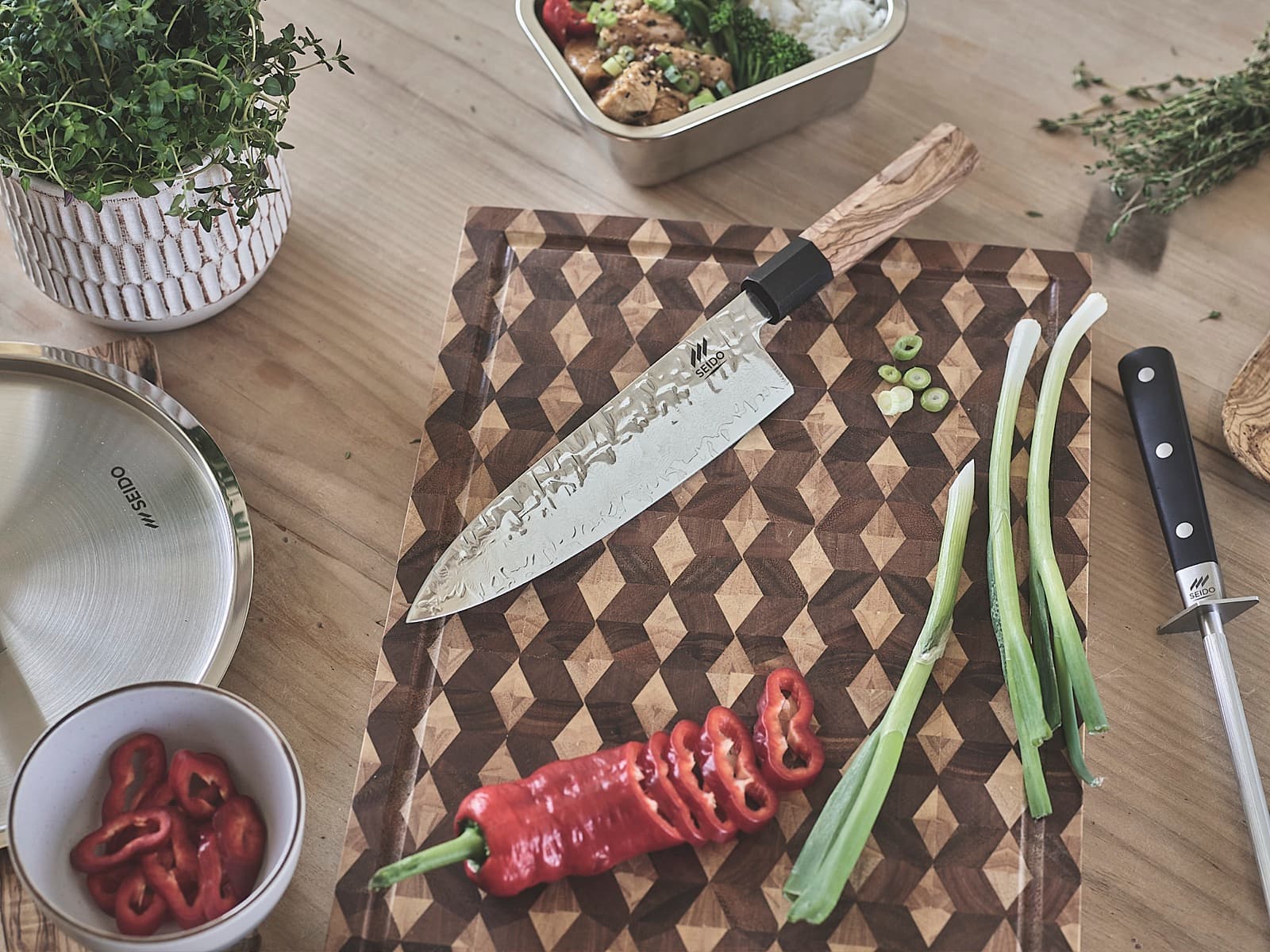 SEIDO chef's knife and honing steel on a kitchen table